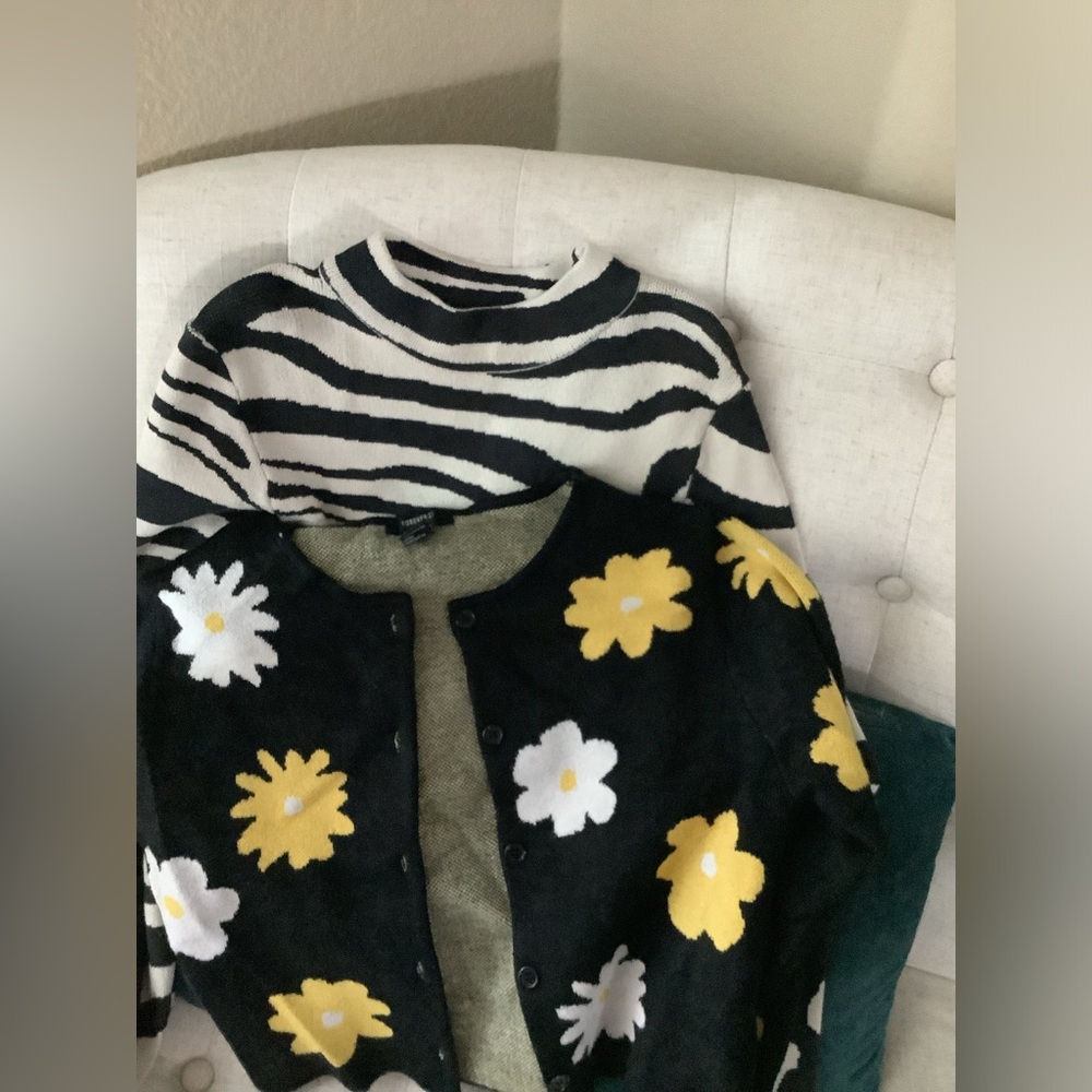 Two (2) sweaters